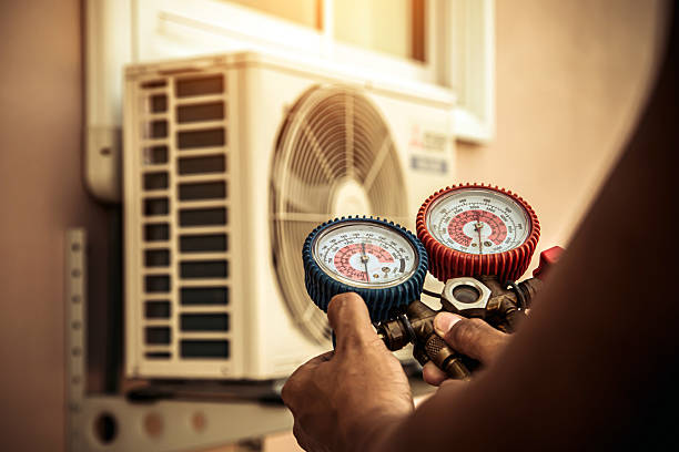 Professional Air Conditioning Service technician working in Dresher, PA